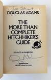 THE MORE THAN COMPLETE HITCHHIKER'S GUIDE [Inscribed]
